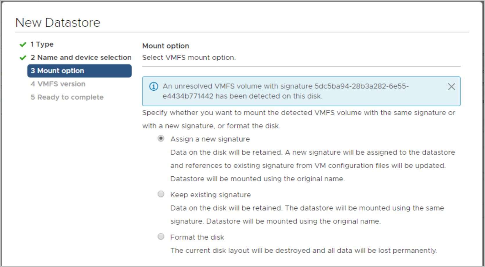 vSphere Client New Datastore workflow with the Assign a new signature option selected.